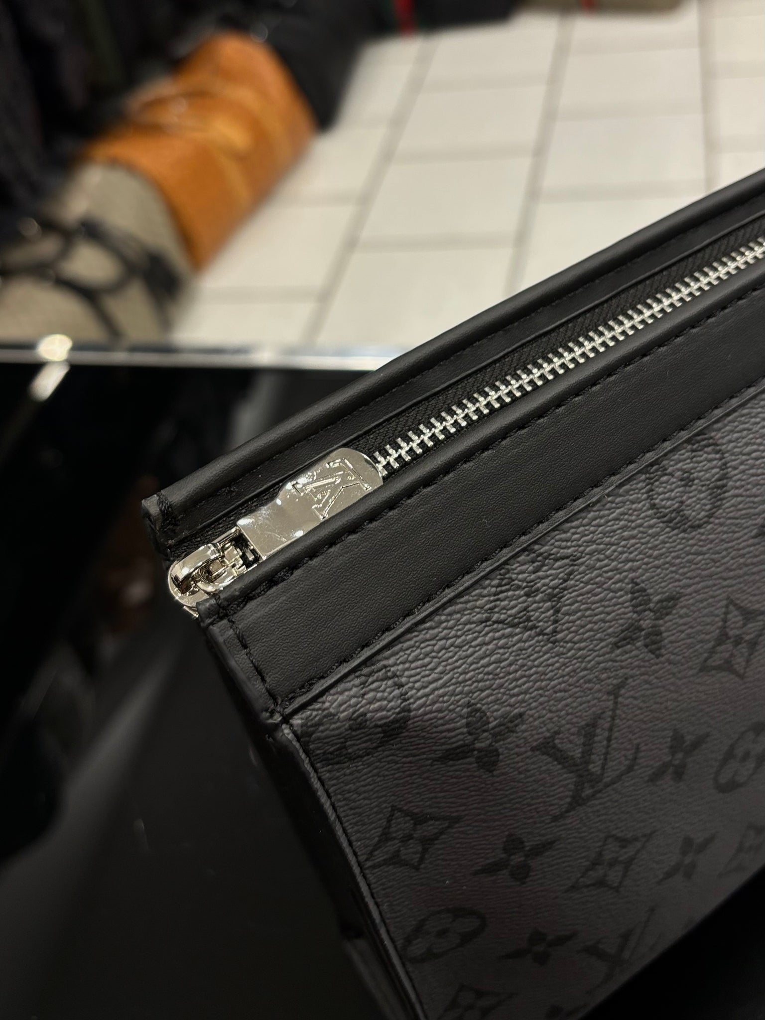 Louis Vuitton Pochette Voyage MM Monogram Eclipse black/grey