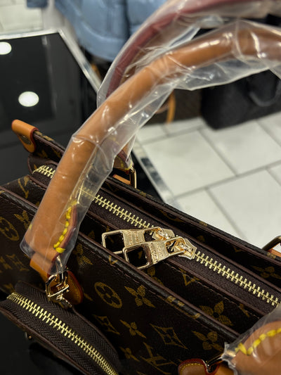 Louis Vuitton OnTheGo PM Monogram brown bag